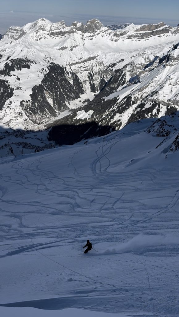 Skier skiing boot top powder down the famous Galtiberg run.