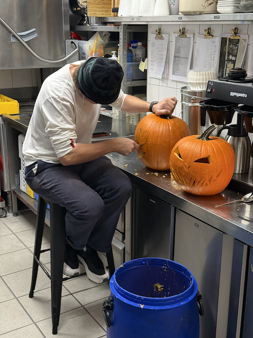 Oliver Carving pumpkins at ski lodge Engelberg
