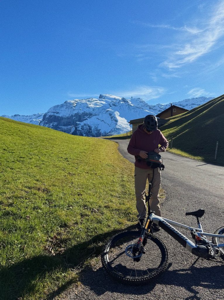 Oliver mountain biking in front of titlis and laub