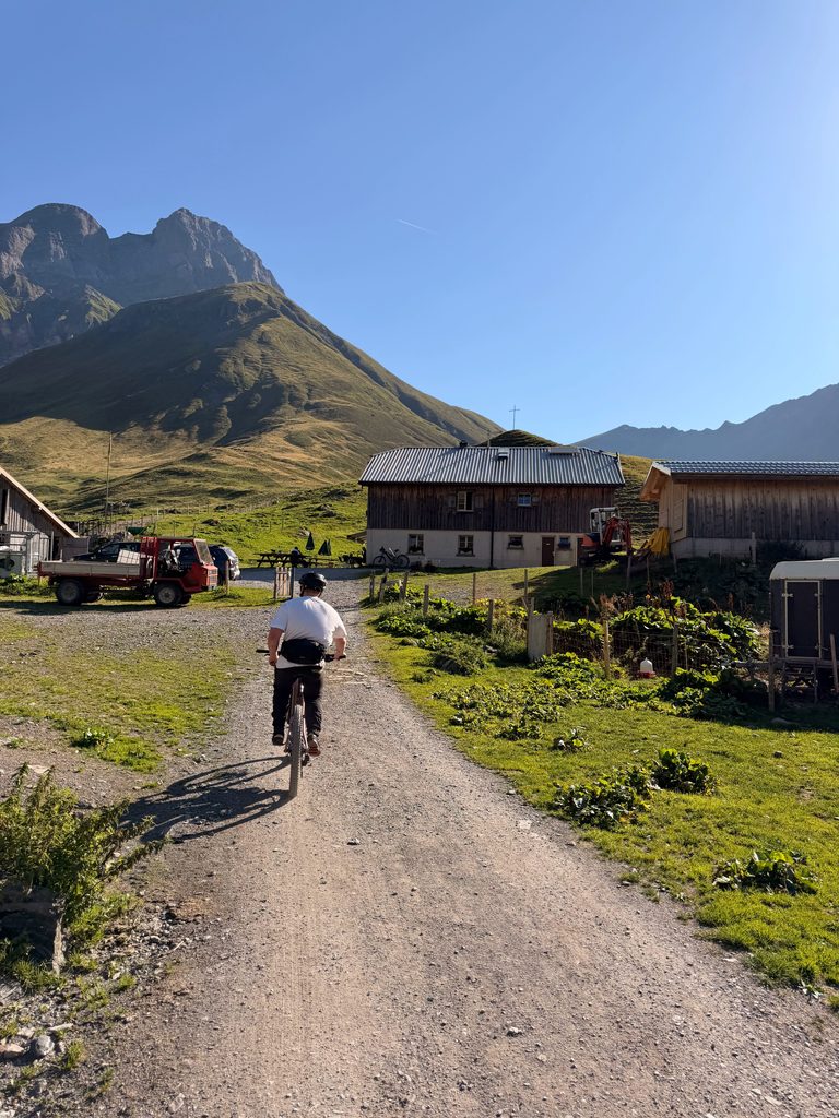 Surenenpass Mountainbiking with Filip arriving at Blackenalp Farm, honestybar and cafe.